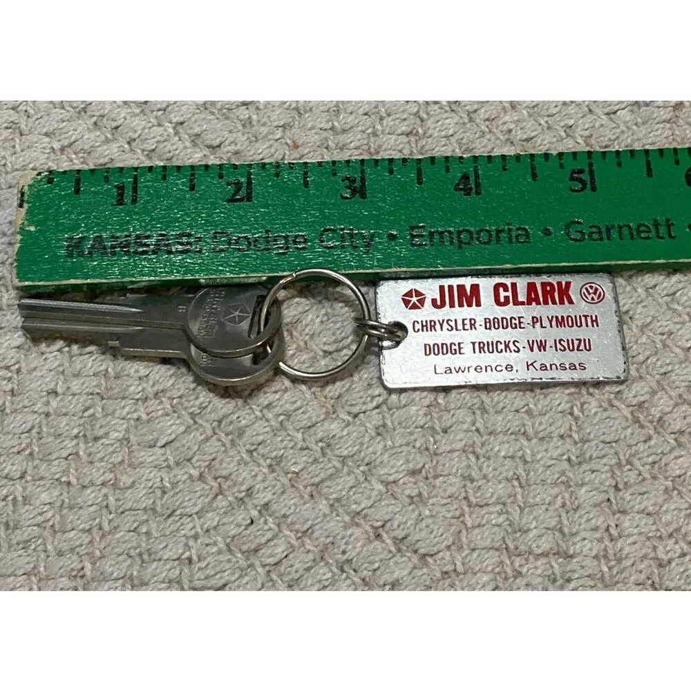 Vintage Jim Clark Chrysler Plymouth Dodge VW Isuzu Key Fob Lawrence KS Metal Tag